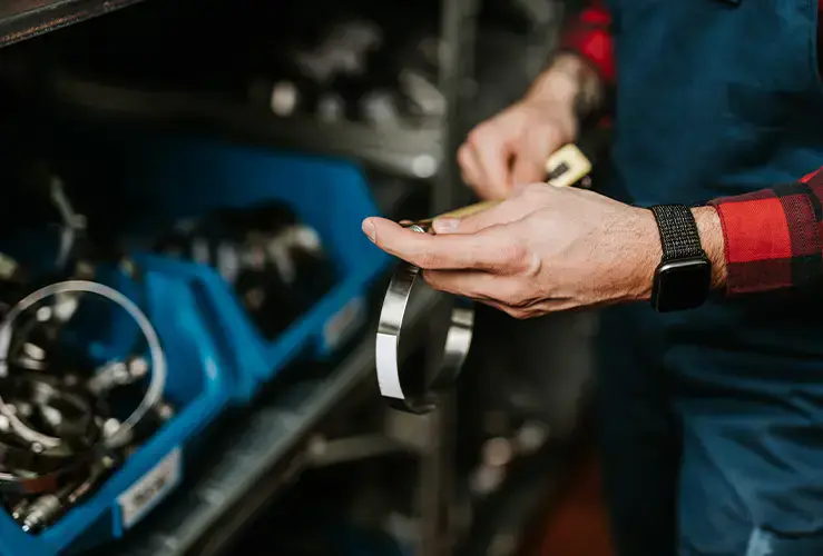 A mechanic working on a car