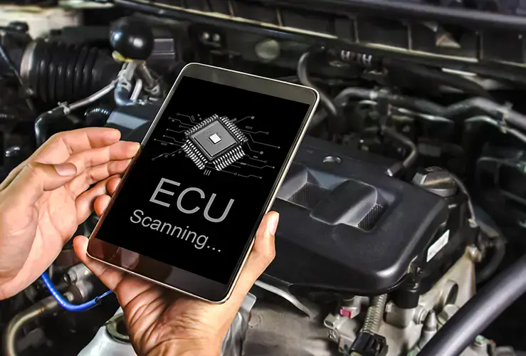 A mechanic running an ECU scan