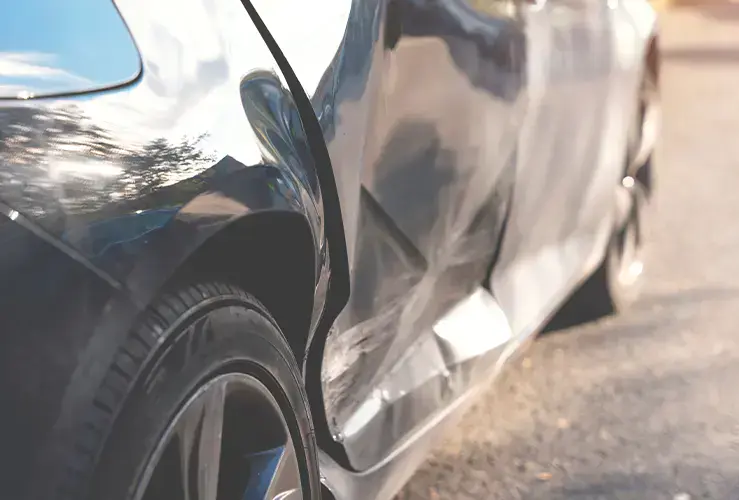 A close up of a damaged car