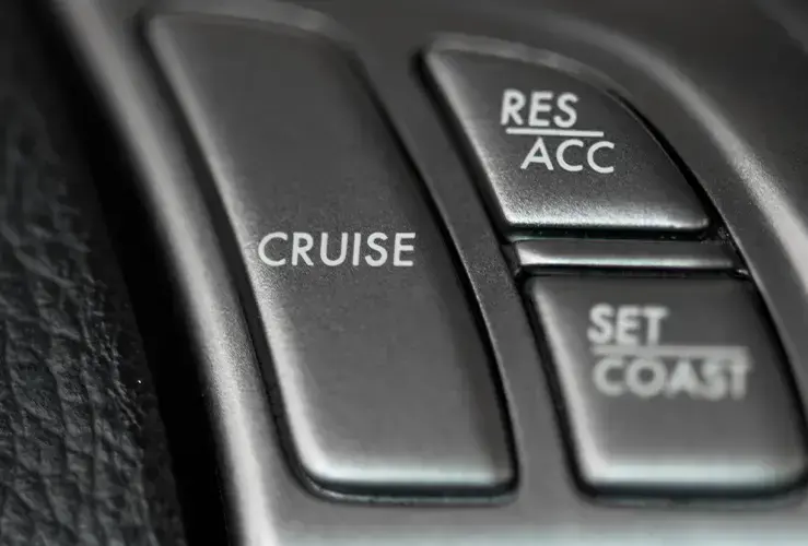 A cruise control button