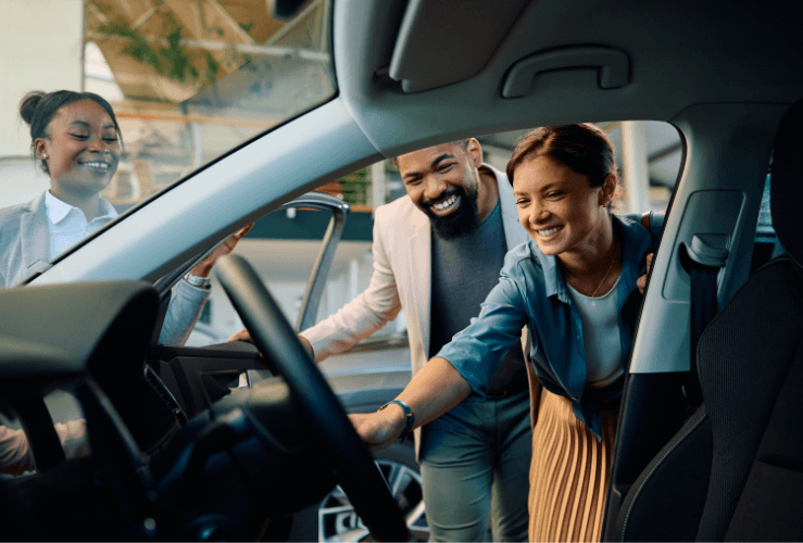 Couple viewing new car
