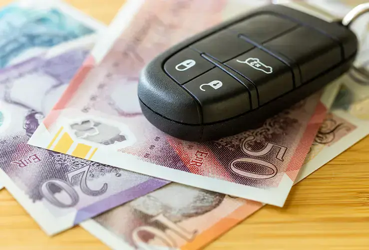 Car keys on some money