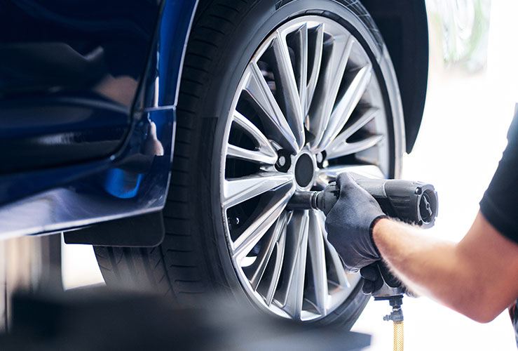 Mechanic changing a tyre