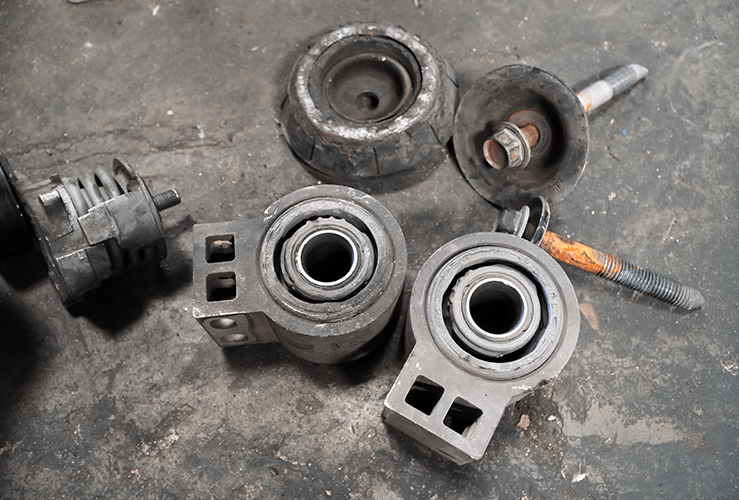 Suspension bushings being replaced