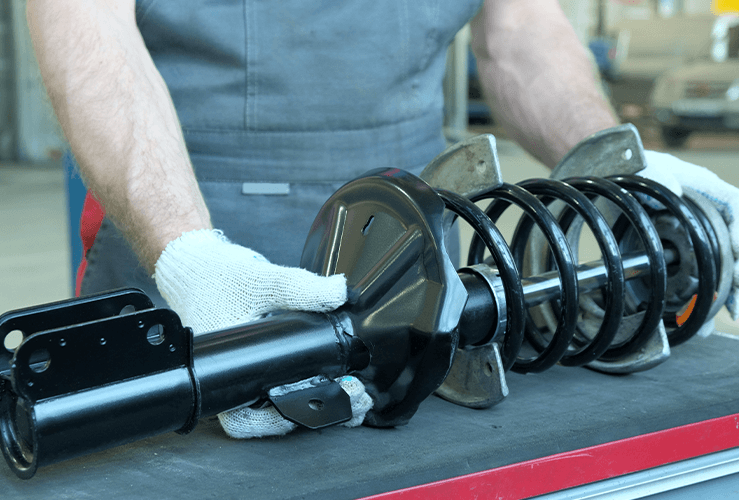 A shock absorber on a work bench