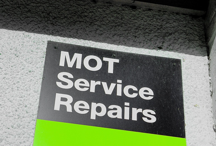 MOT sign on wall