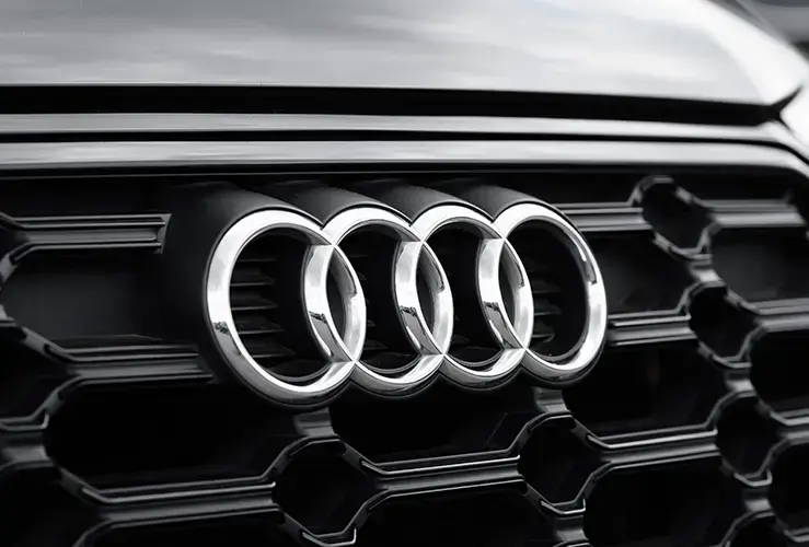 A closeup of the Audi logo on a car