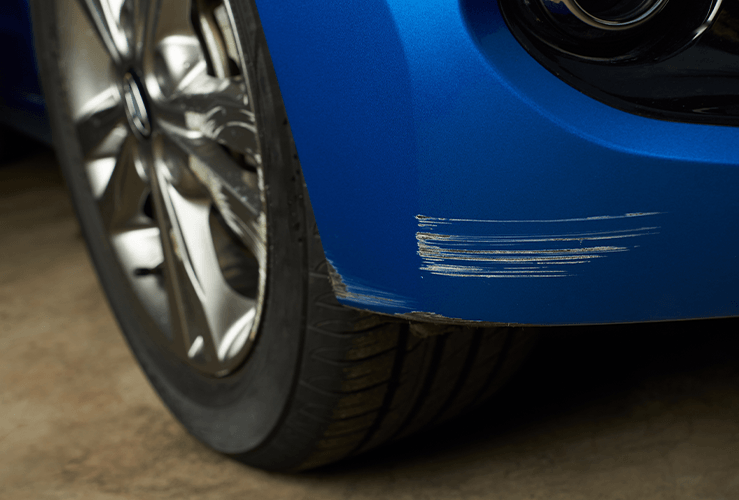 A car with a scratch on the front